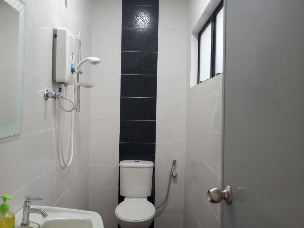 Sunshine Jonker Guesthouse Malacca Værelse billede